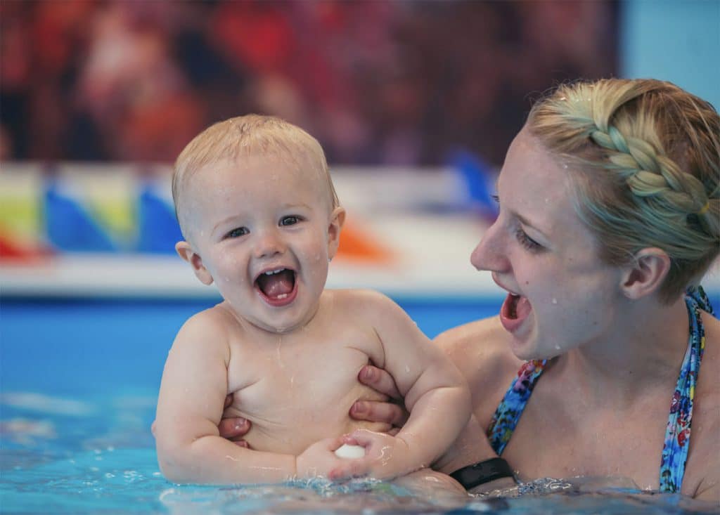 Happy Mom and Child at SwimKids Utah