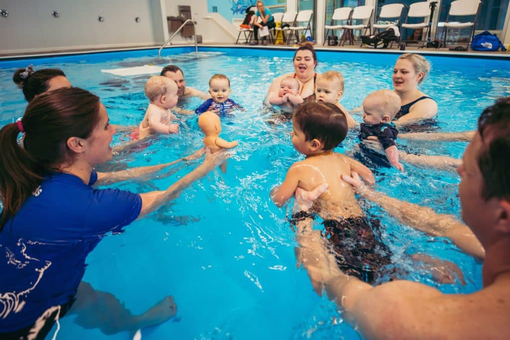 Babies in the Middle of Parent-Tot Class at SwimKids Utah