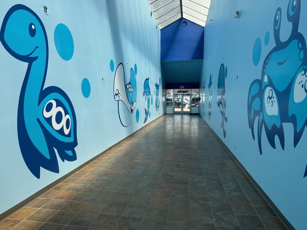 Bright and Spacious Hallway Leading to SwimKids Utah Facility